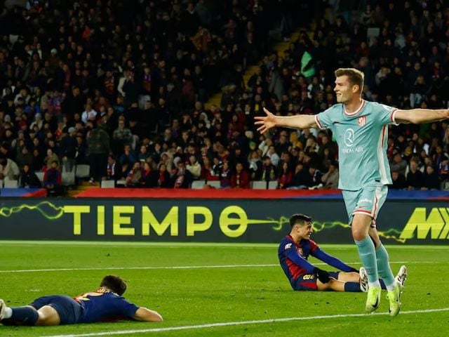 Atletico Madrid edge Barcelona to claim top spot in La Liga