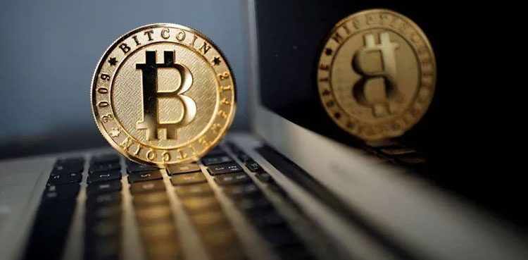 Bitcoin slides below $100,000 as Trump tariffs rattle markets