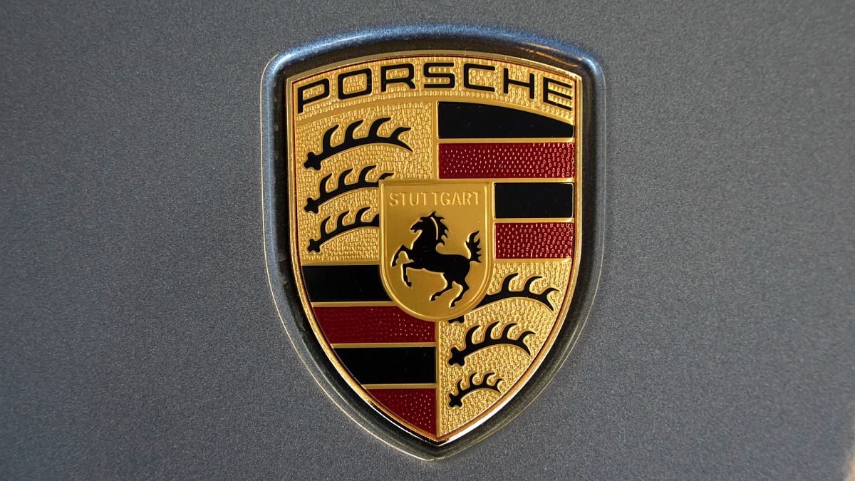 Porsche shares fall as company warns of lower sales