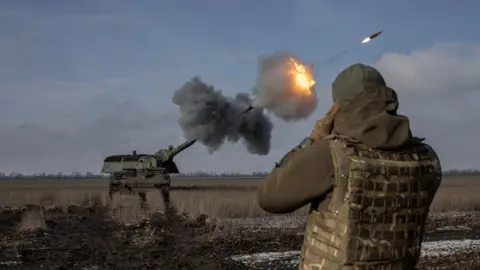 Reuters A German howitzer fires at Russian positions near Bakhmut in February 2023