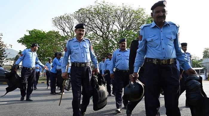 Police official held hostage by drug peddlers in Islamabad