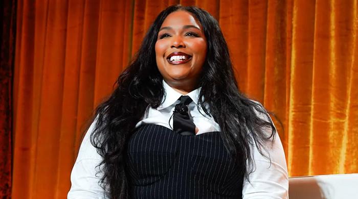 Lizzo flexes weight loss progress on tour stage