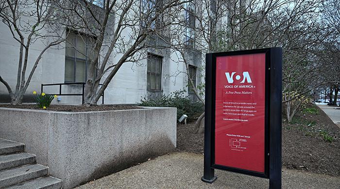 Trump admin begins mass layoffs at Voice of America