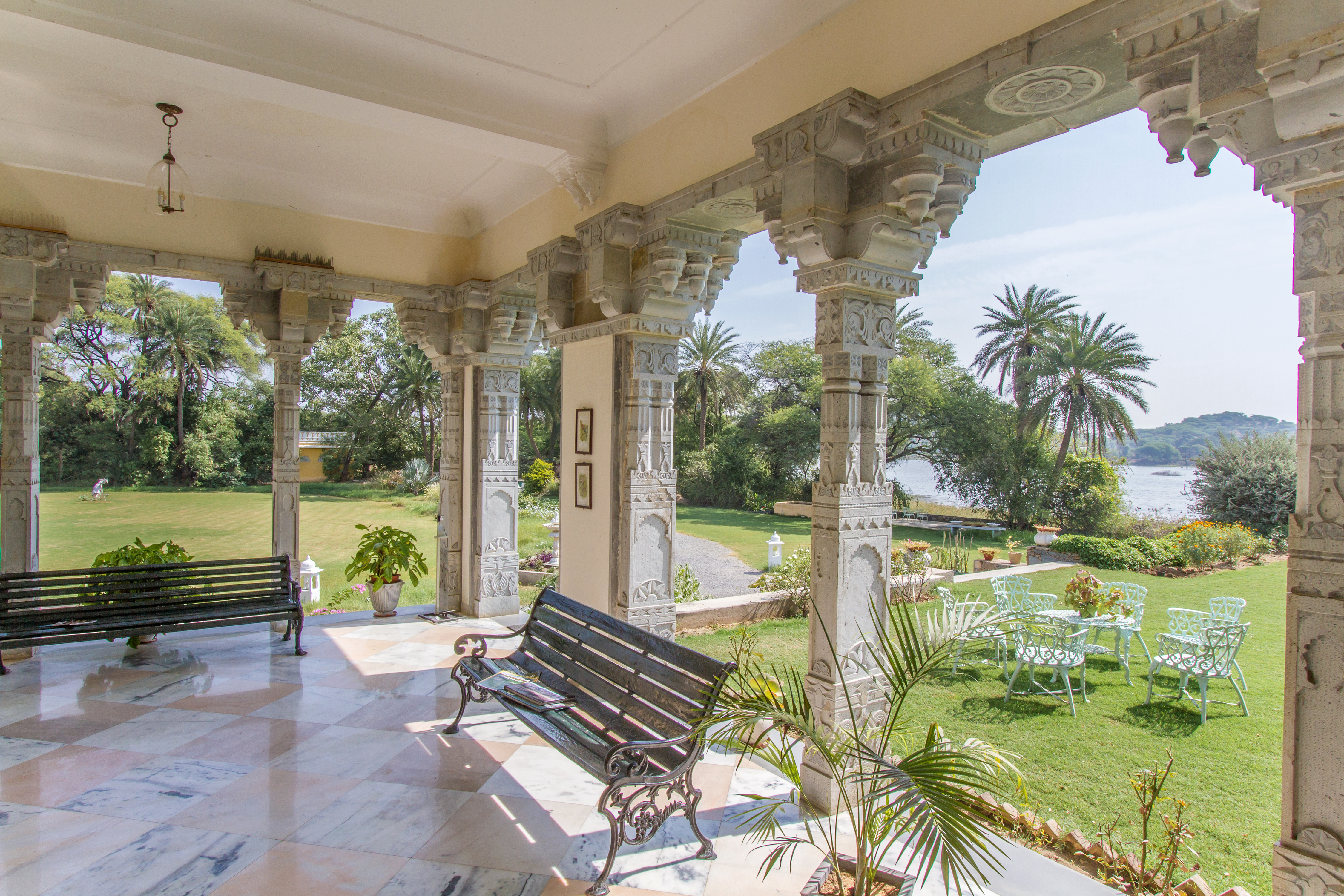 View of Dev Shree Deogarh through ornate columns.