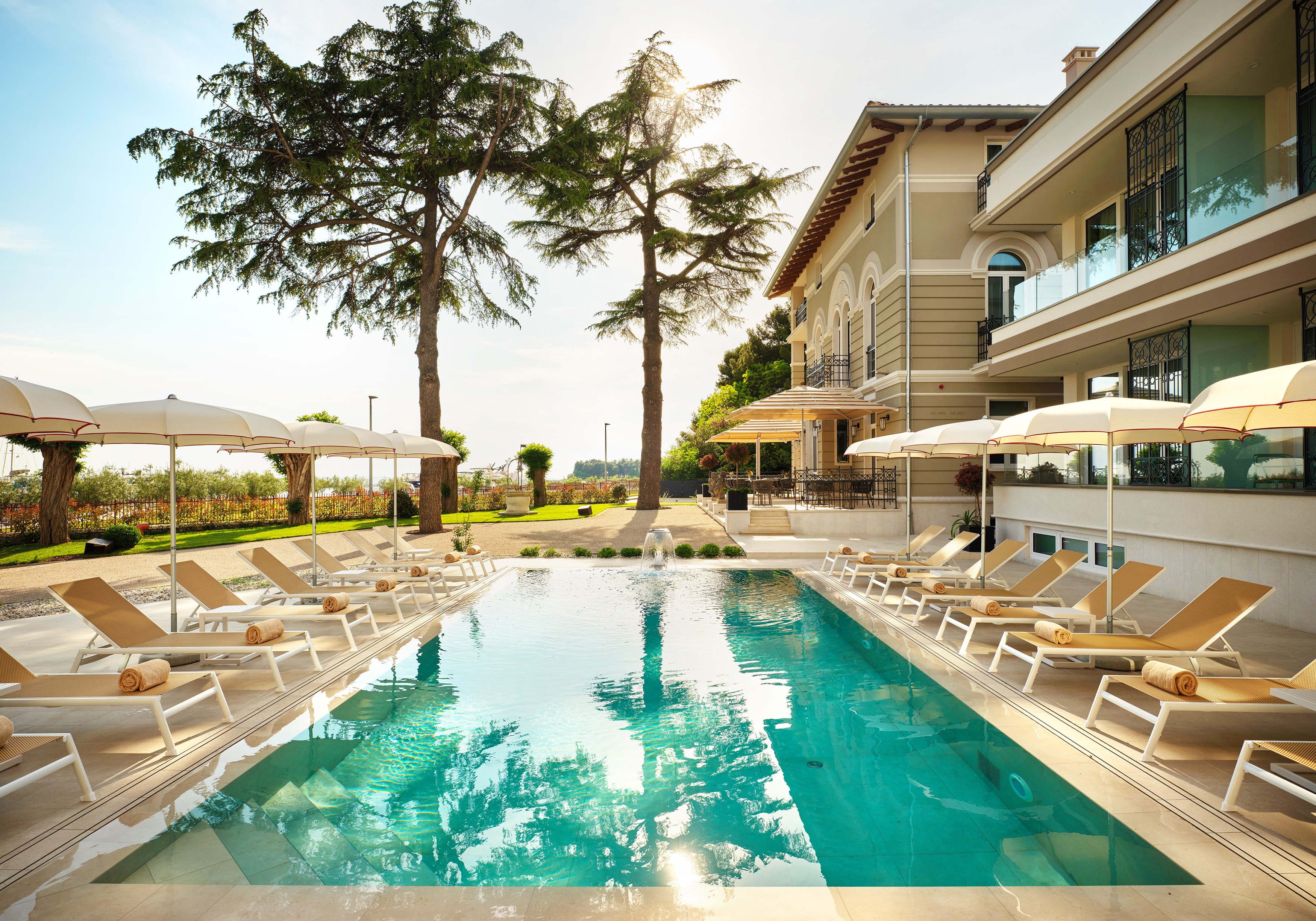 Palazzo Rainis Hotel and Spa pool and lounge chairs.