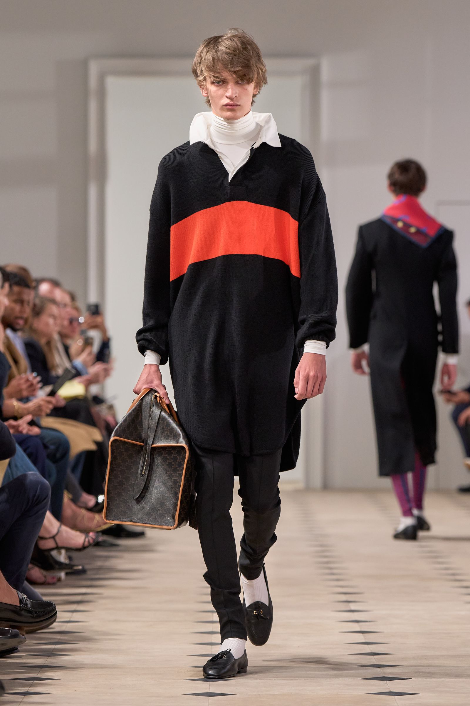Image may contain Niels Schneider Accessories Bag Handbag Clothing Footwear Shoe Long Sleeve Sleeve and Person