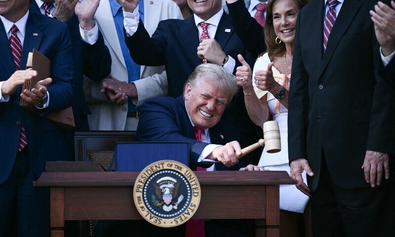 Trump signs his flagship tax, spending bill into law – World