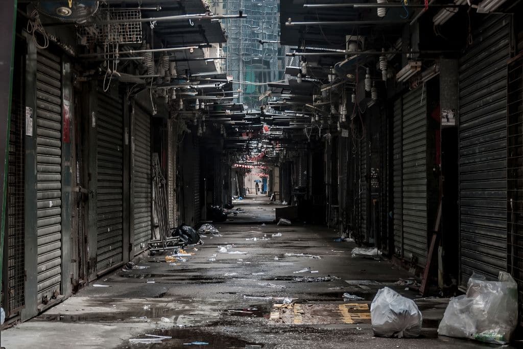 A backstreet in Hong Kong littered with plastic.