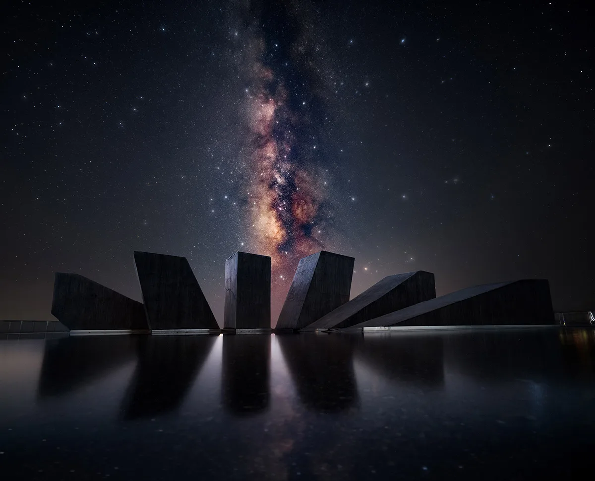 Gateway to the Galaxy © Yujie Zhang. Taken with a Nikon Z 8 camera, 15 mm f/4, ISO 2,000, multiple 480-second exposures. Location: Songyang County, China, 10 August 2024
