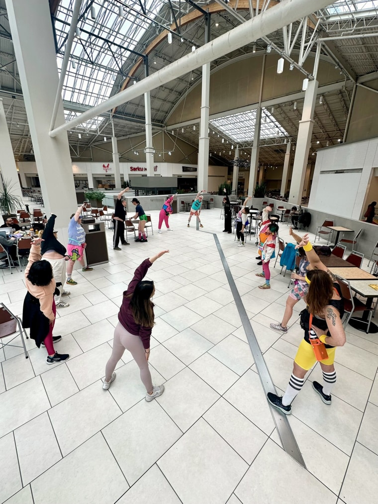 Members of “Food Court 5000,” a mall-walking group, stretch it out at the Lloyd Center in Portland, Oregon. 