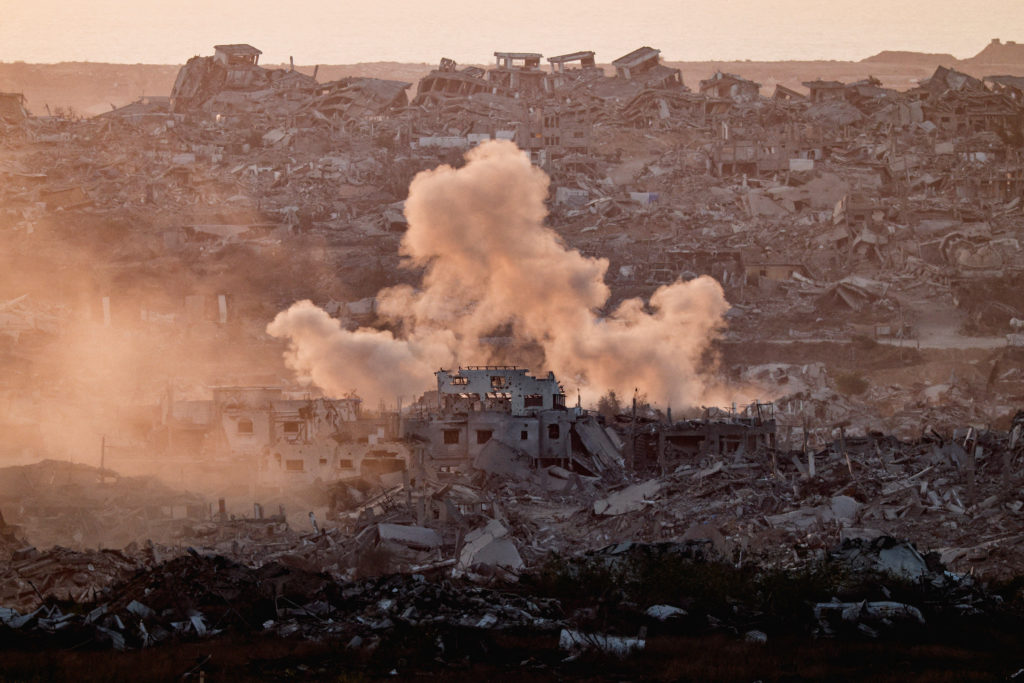 Smoke rises from Gaza after an explosion