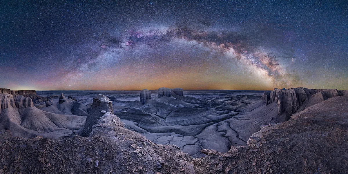 Into the Past © Jim Hildreth. Taken with an astro-modified Canon EOS R and EOS R5 cameras, 28mm f/2.8 and f/8, ISO 800 and 100, Sky: 59-second exposure, Land: 3-second exposure. Location: Moonscape Overlook, Wayne County, Utah, USA, 11 April 2024