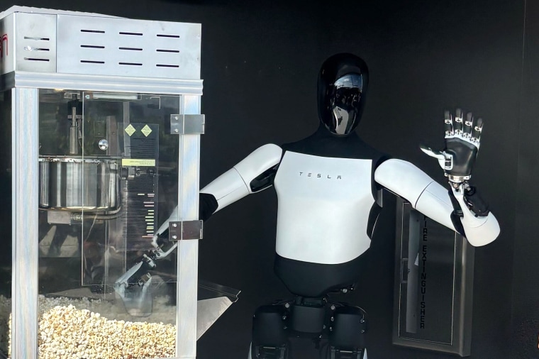tesla diner California optimus tesla robot popcorn machine