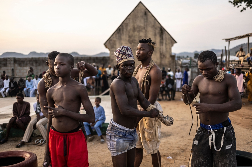Dambe fighters prepare for a match in the Dei-Dei neighbourhood in Abuja, on June 27, 2025. — AFP pic