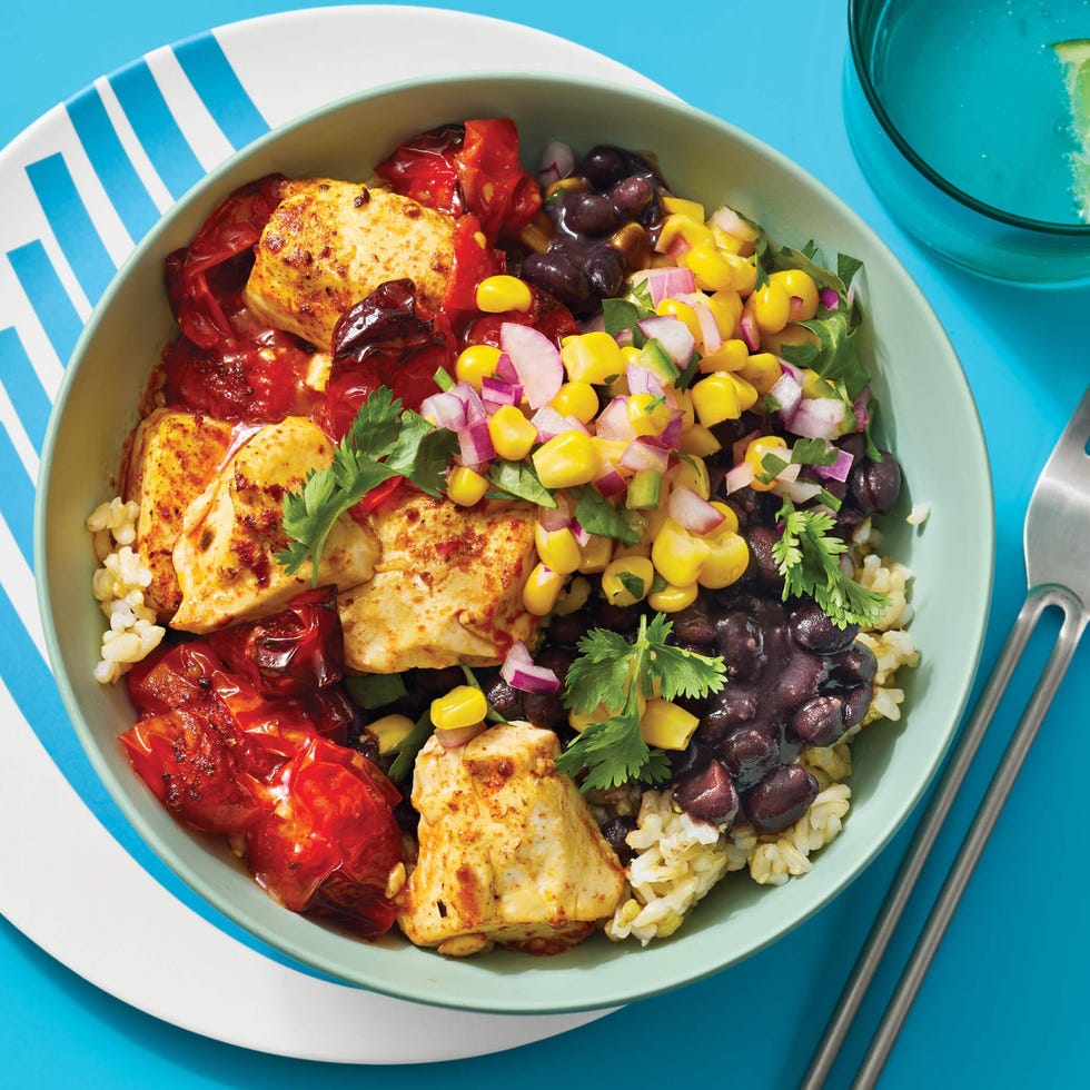 vegetable and tofu bowl on top of table