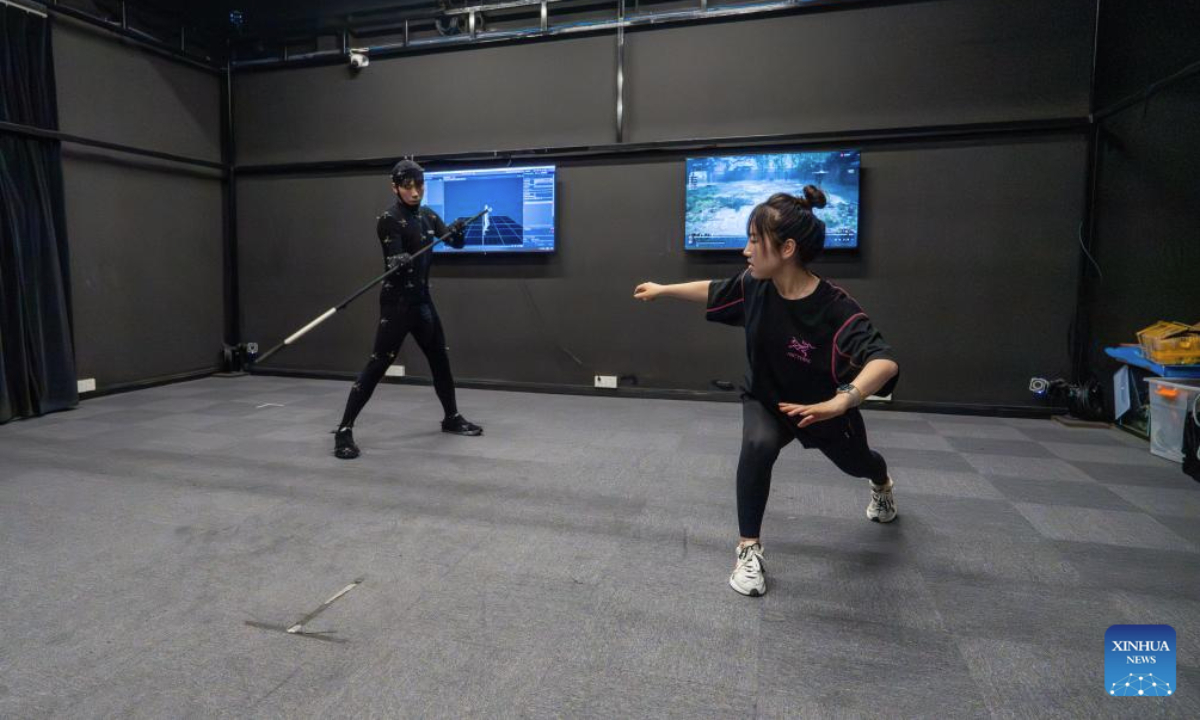 Employees of Leenzee Games are pictured during a motion-capture session in Chengdu, southwest China's Sichuan Province, July 16, 2025. (Xinhua/Xue Chen)