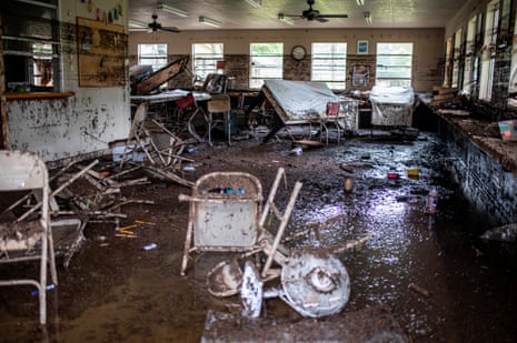 Furniture lie scattered inside a cabin at Camp Mystic after deadly flooding in Kerr County.