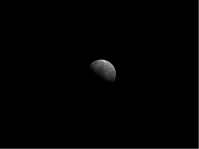 A photo of the moon taken from outer space shows its small size and shadows