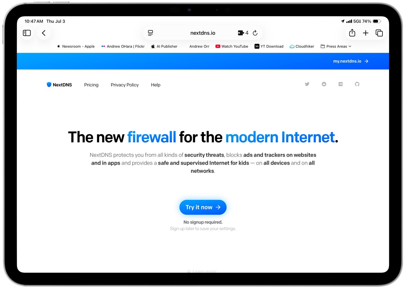 Tablet screen displaying NextDNS website promoting a new firewall for internet security, with a call to action button labeled 'Try it now'.
