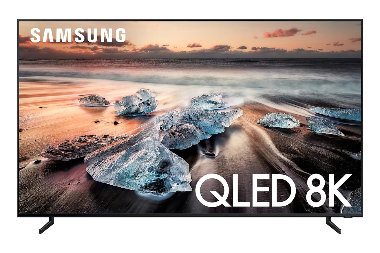 Samsung QLED 8K TV displaying a scenic sunset over a beach with ice formations on the sand and gentle waves in the background.