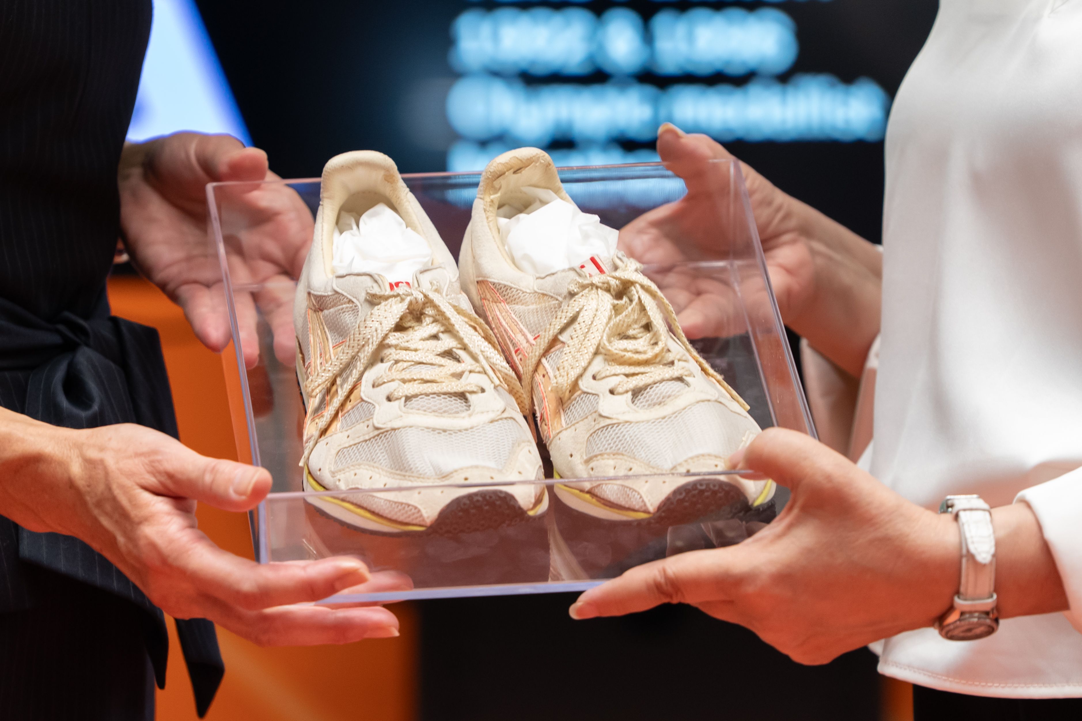 Yuko Arimori donates her Barcelona Olympic Games marathon shoes to the MOWA