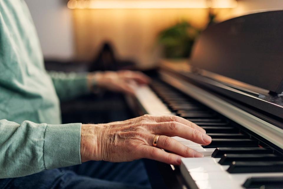 Older adults with long-term musical training performed better at understanding speech in noisy environments and showed brain connectivity patterns closer to younger people (Getty Images)