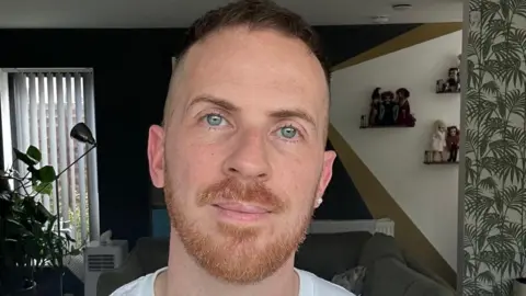 Steven Elliott looking directly at the camera 