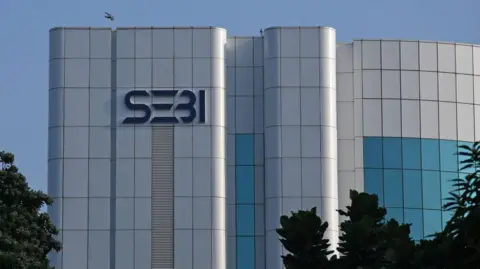 Getty Images A Securities and Exchange Board of India (Sebi) logo is seen on the office building at the Bandra Kurla Complex business district in Mumbai.