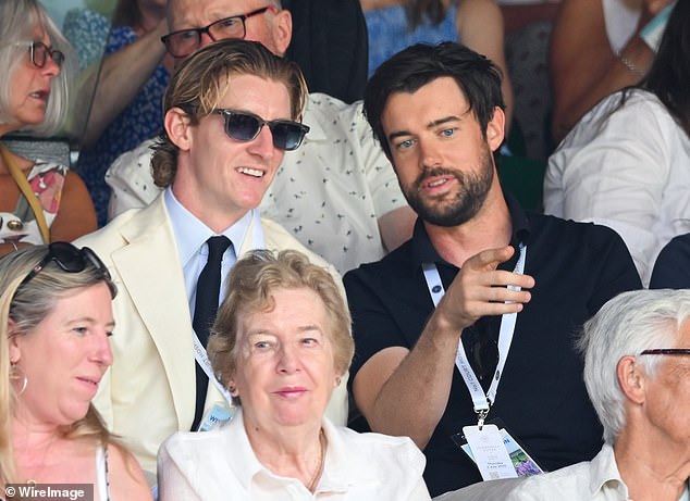 England footballer Anthony Gordon and Jack Whitehall sat together on Centre Court