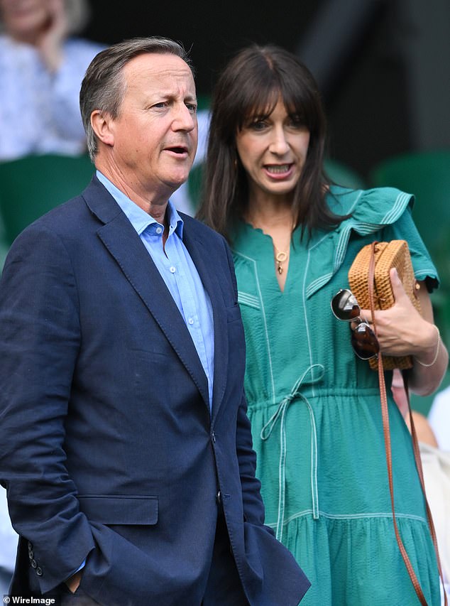 Samantha looked chic in a teal summer dress complete with a tiered skirt and drawstring waist