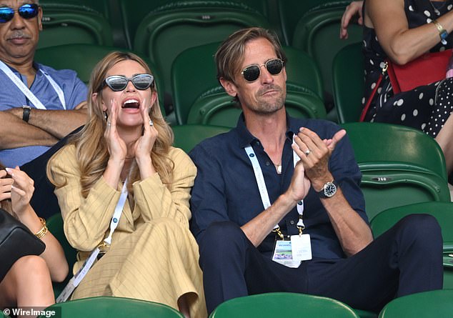 The couple got animated as they watched in from the stands during one of the day's big matches