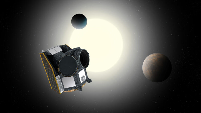Boxy spacecraft floating in front of distant sun, with a couple of planets in the picture.