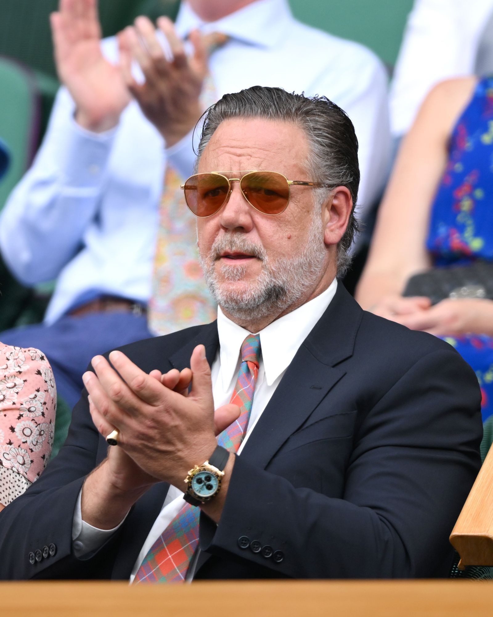 Image may contain Russell Crowe Accessories Glasses Formal Wear Tie Jewelry Ring Adult Person Wristwatch and Baby