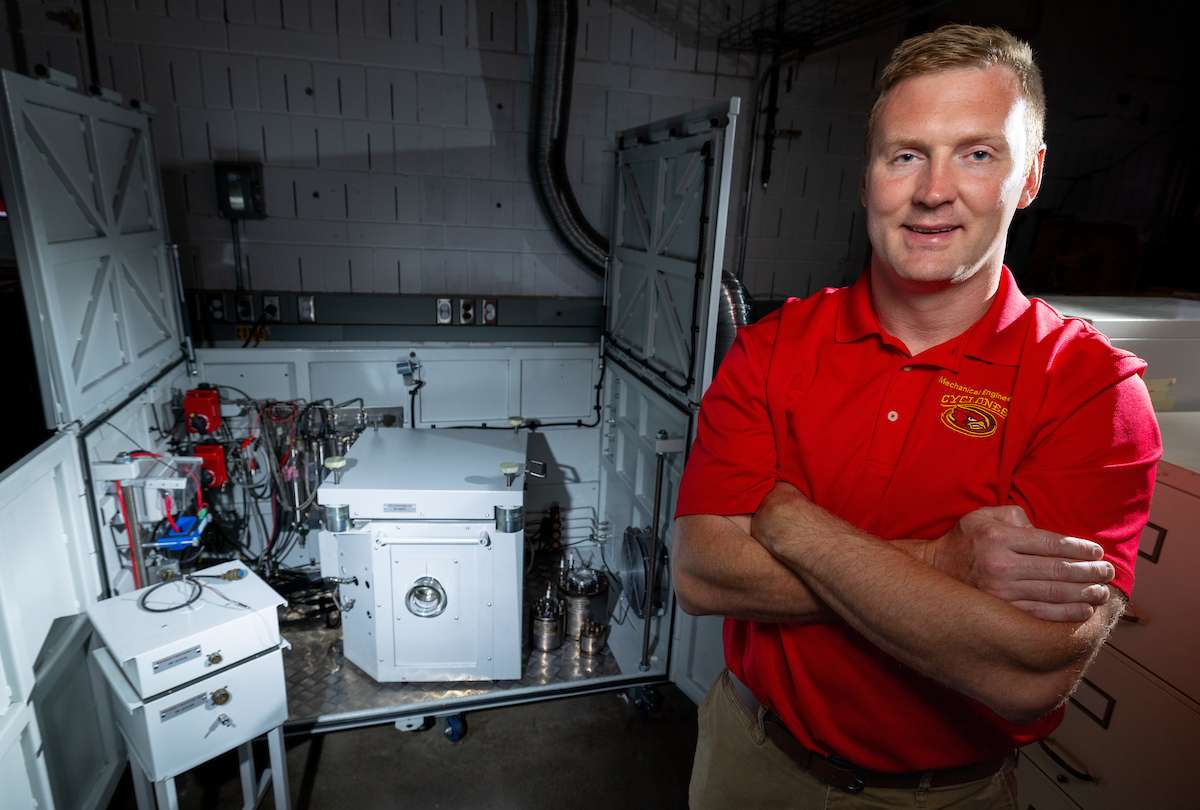 Todd Kingston is using an accelerating rate calorimeter system to safely test battery safety and performance. Photo by Christopher Gannon.