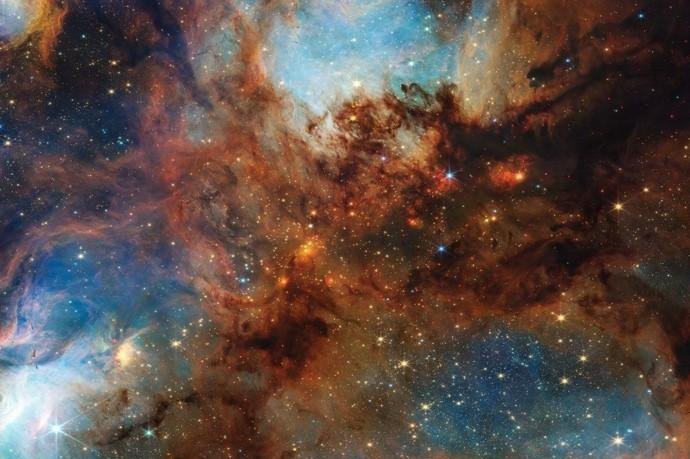 NASA ‘claws back’ thick dust layer in Cat’s Claw Nebula