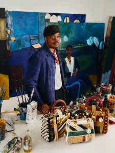 Patrick Eugène with his designs for the Dior Lady Art project