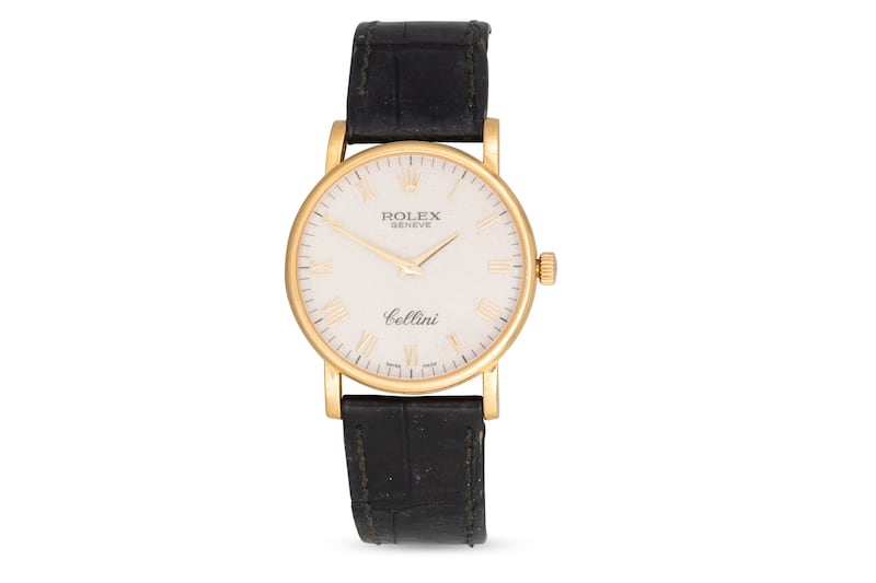 A lady’s Rolex Cellini cream face wristwatch with Roman numerals and an 18ct gold case, clasp and buckle on a black leather strap (€3,000-€4,000), at O'Reilly's auction on July 23rd