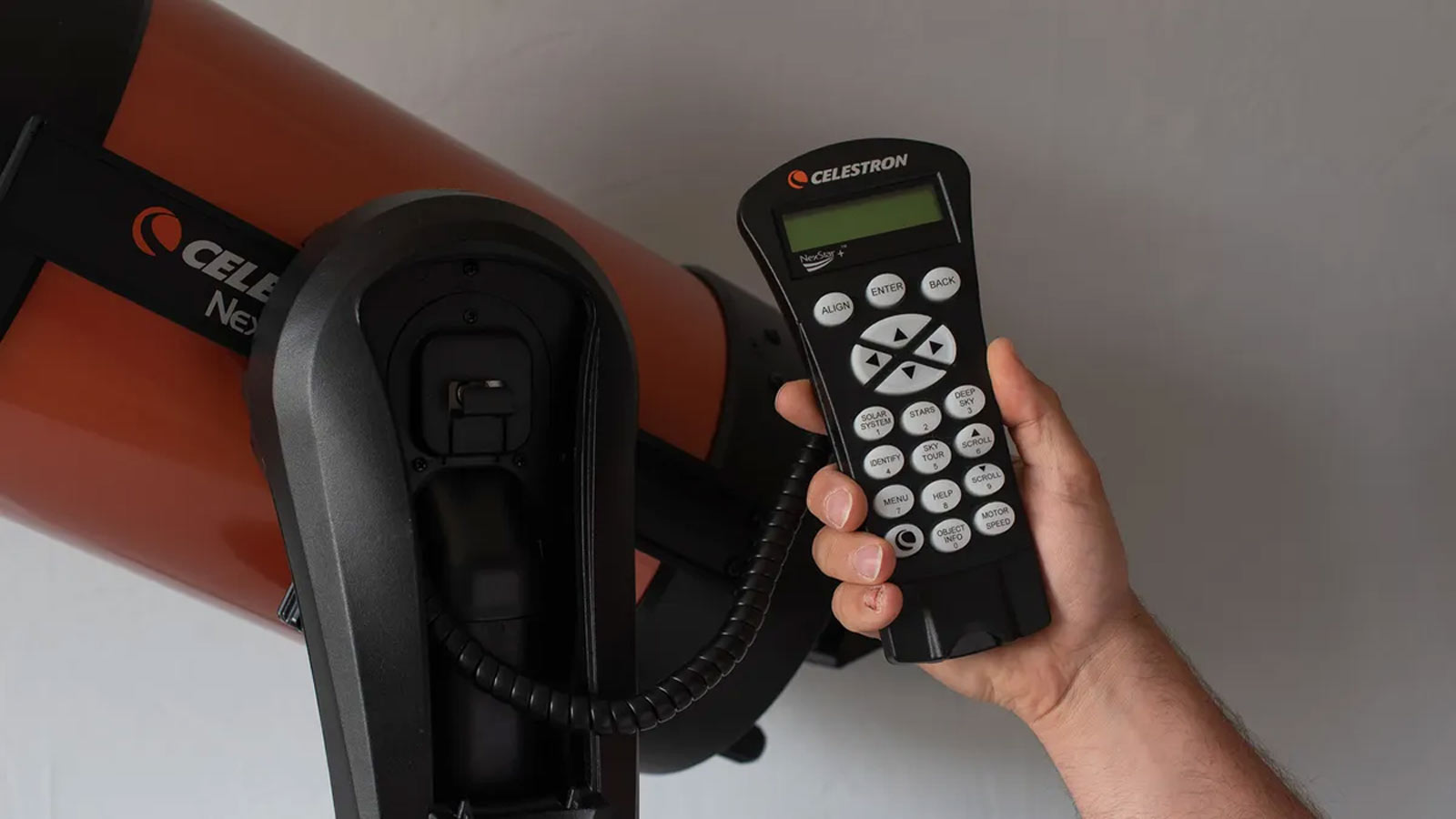 Review photos of the Celestron NexStar 8SE telescope with its orange optical tube 