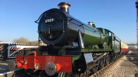 Buckinghamshire Railway Centre A green and black locomotive