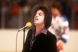NEW YORK, NY - 1970'S:  Musician Billy Joel sings the National Anthem prior to an NHL game with the New York Rangers circa 1970's at the Madison Square Garden in New York, New York.  (Photo by Bruce Bennett Studios via Getty Images Studios/Getty Images)