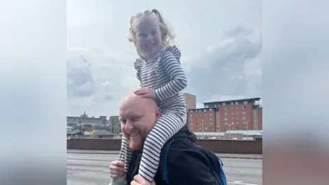 Supplied An informal shot of Callum with Eliyah riding on his shoulders