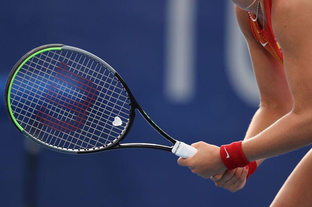 A close-up shot of Paula Badosa's white heart-shaped dampener on her Wilson tennis racket during the 2021 Olympic Games in Tokyo, Japan.