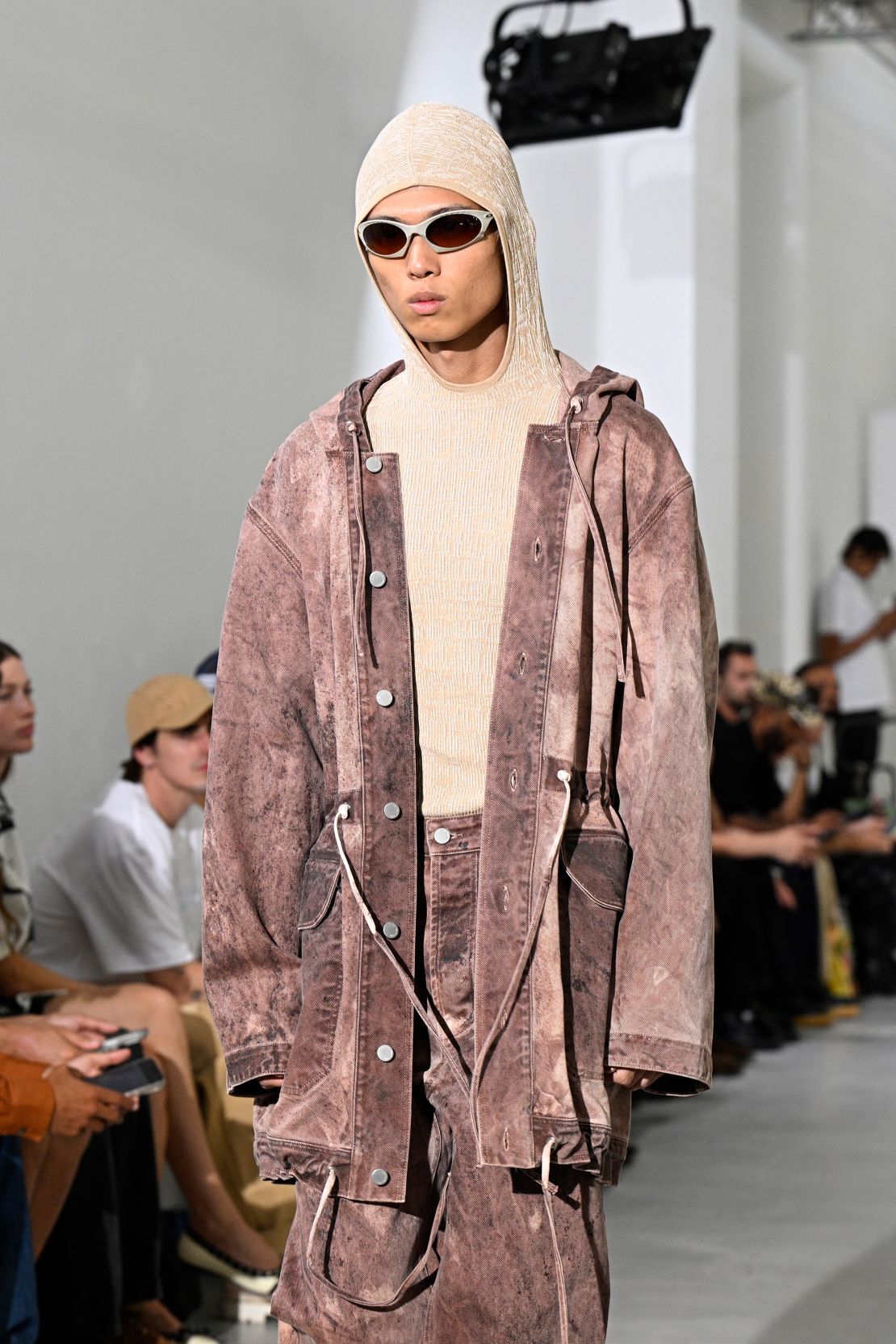 At Études, the collection featured washed denim, exposed zippers, with textures that appeared faded, bleached and cracked.