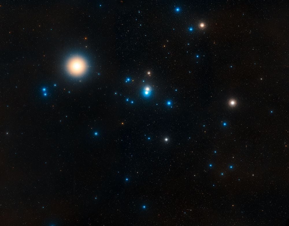 The Hyades cluster is the closest cluster to Earth. It's about 153 light-years away and contains hundreds of stars in a spherical grouping. Image Credit: NASA, ESA, and STScI.