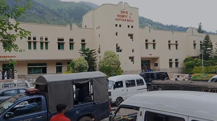 25 children, driver injured after school van plunges into ravine in AJK