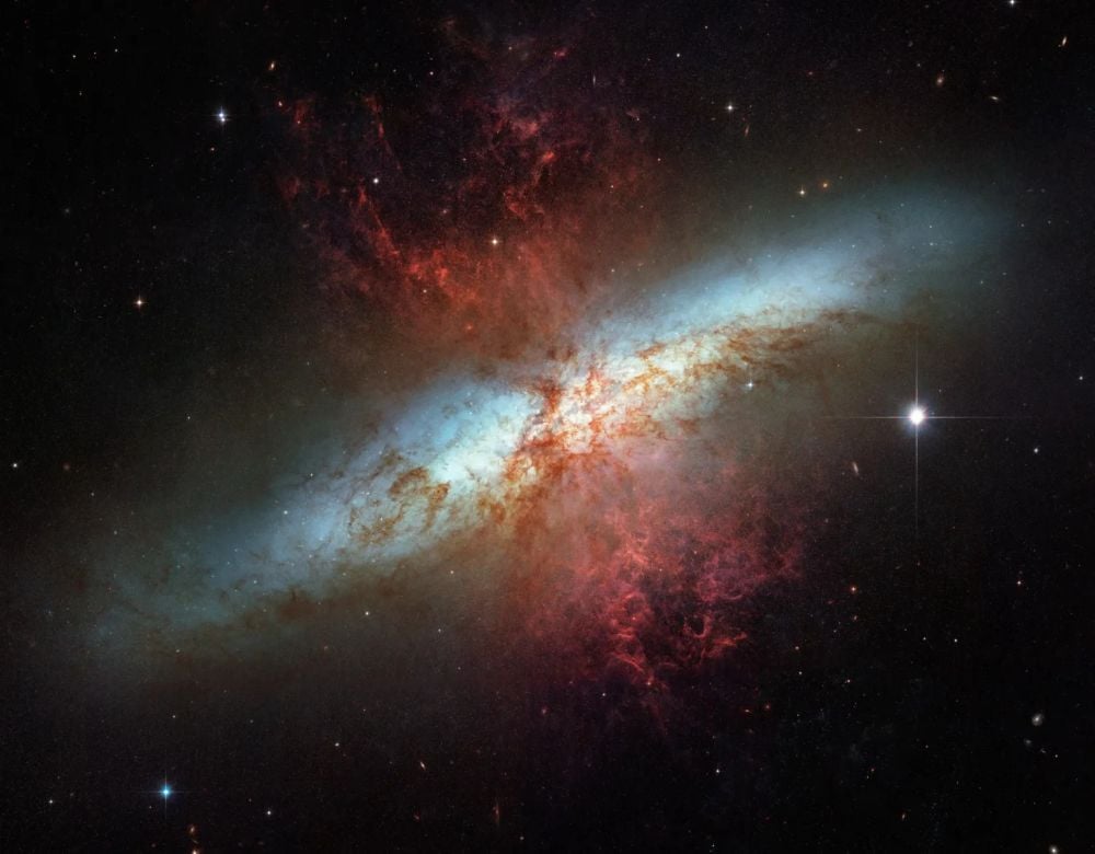Hubble captured this brilliant image of M82 that highlights the filaments of wind-borne gas in red. Image Credit: NASA, ESA and the Hubble Heritage Team (STScI/AURA); Acknowledgment: J. Gallagher (University of Wisconsin), M. Mountain (STScI) and P. Puxley (National Science Foundation)