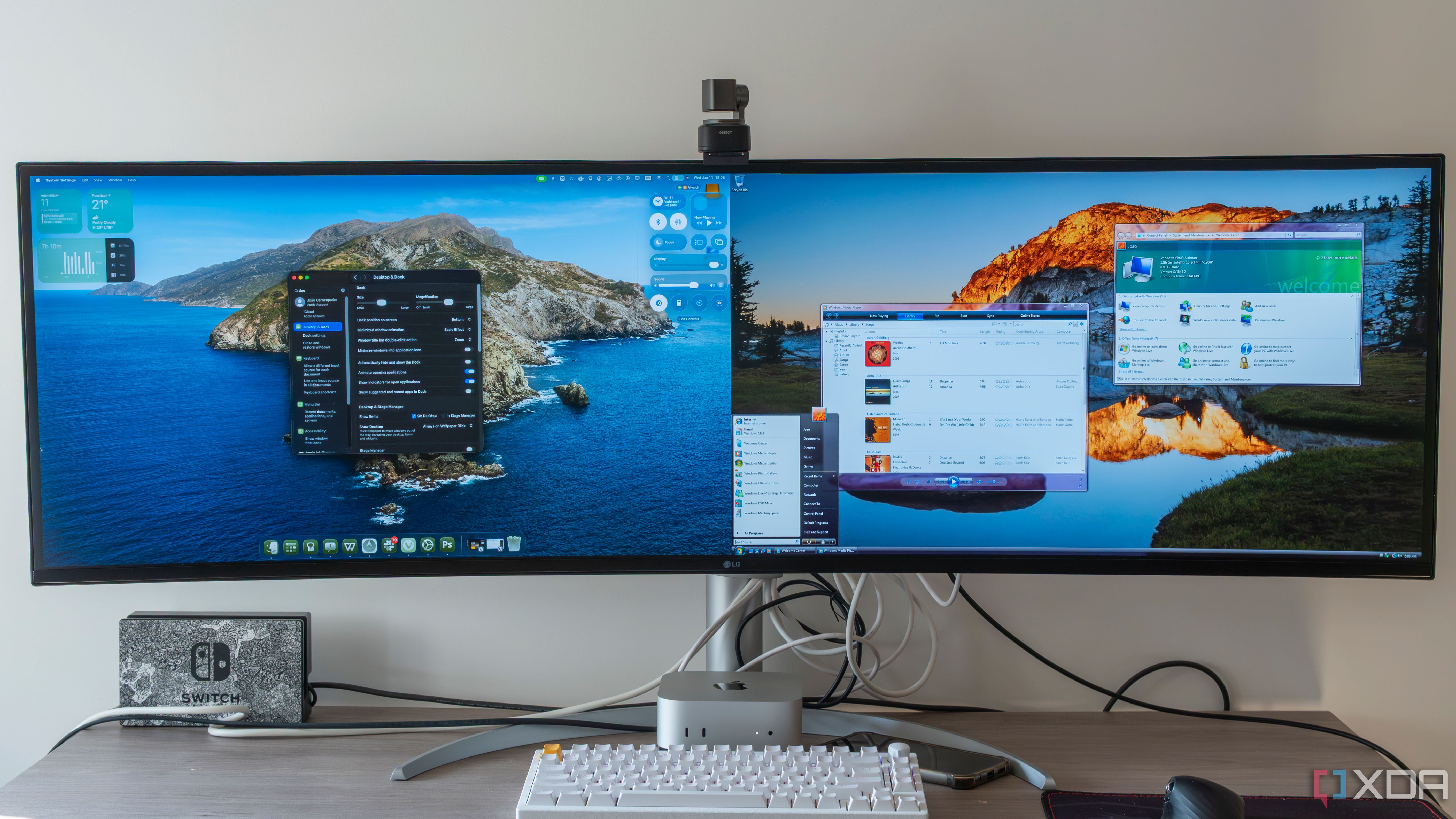 An ultrawide monitor displaying macOS 26 Tahoe and Windows Vista side by side