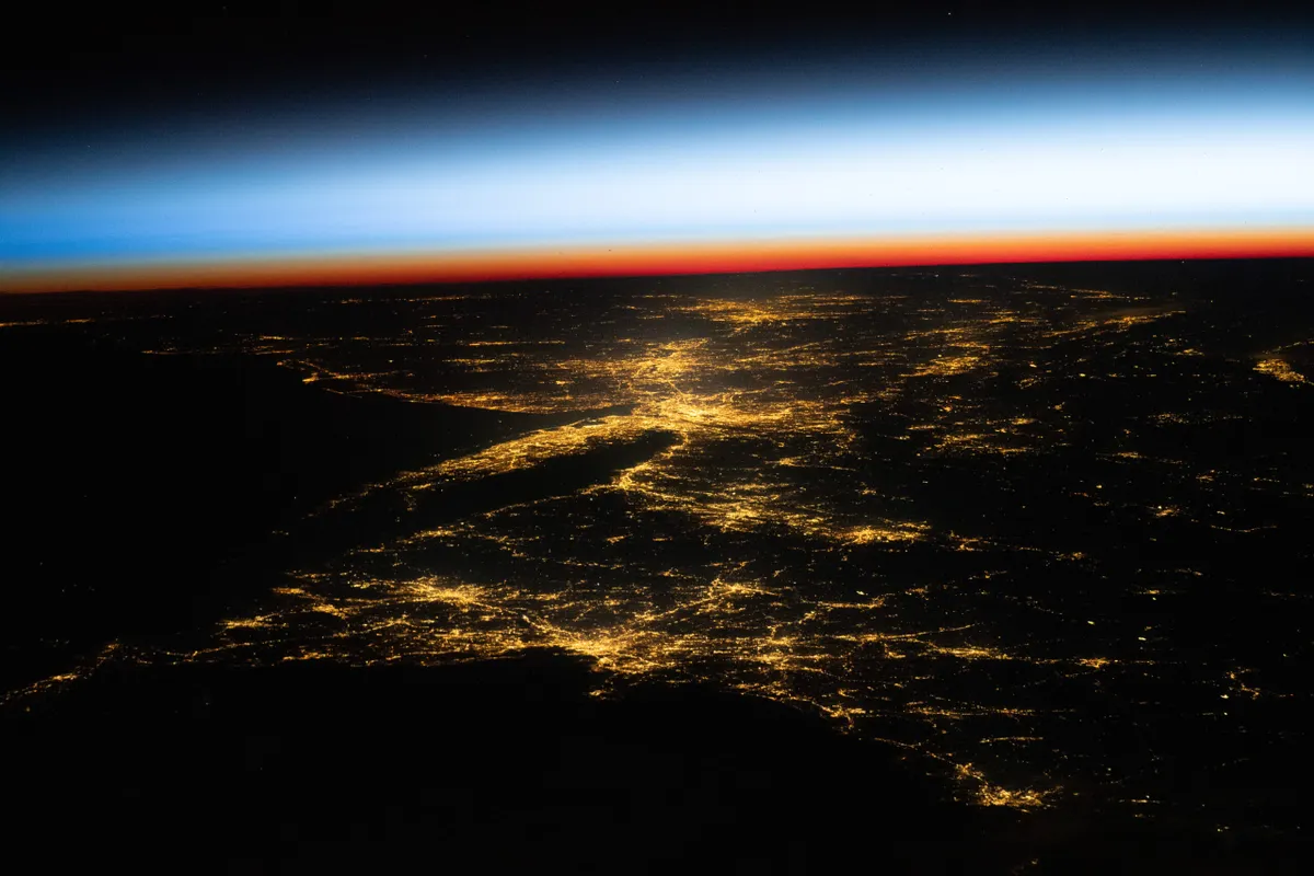 A view of northeastern USA at night, from space, including cities Washington, Philadelphia, New York and Boston. Credit: NASA/JSC Gateway to Astronaut Photography of Earth.