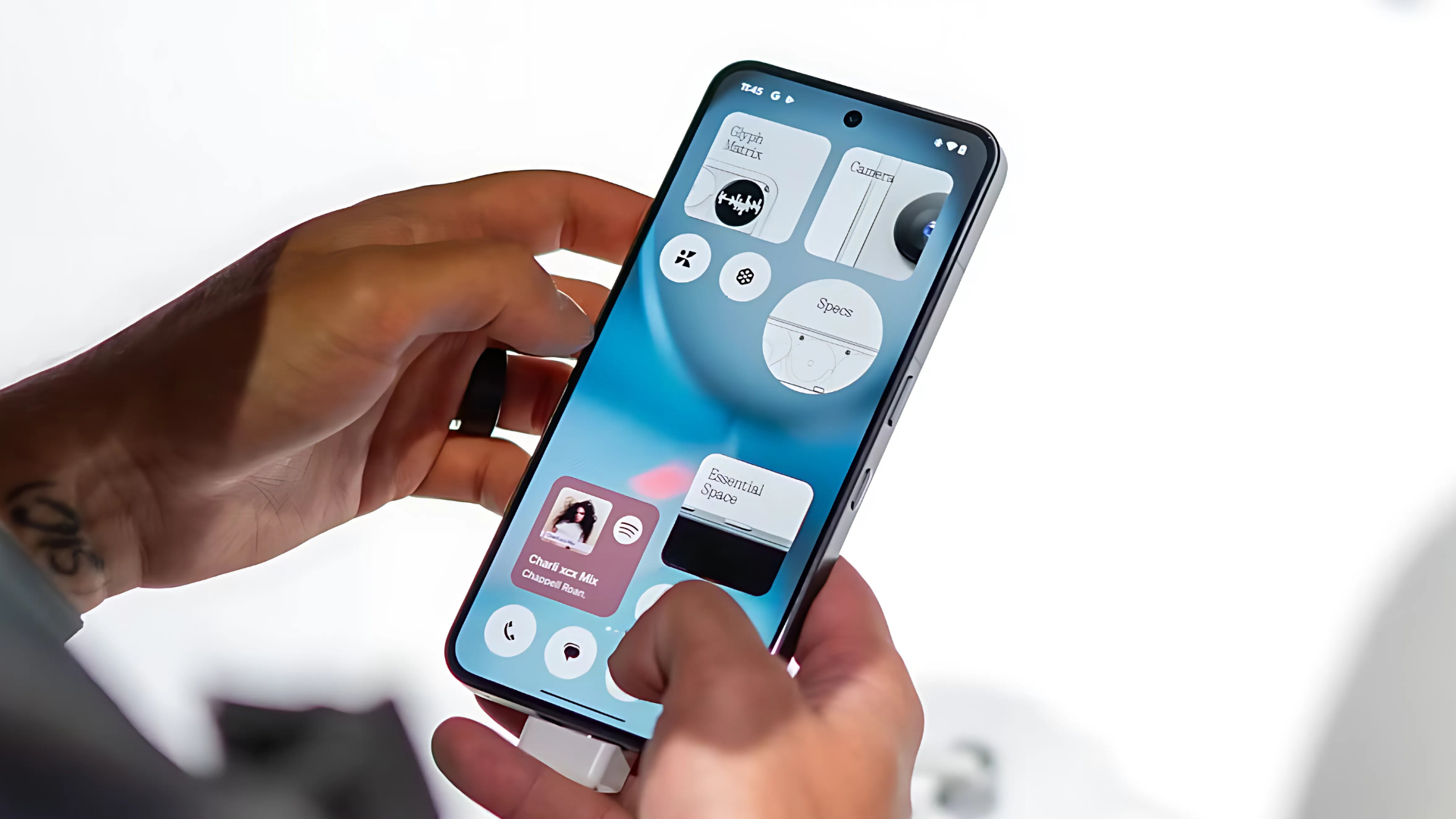 A person holding the Nothing Phone (3) in hand with the screen facing up.