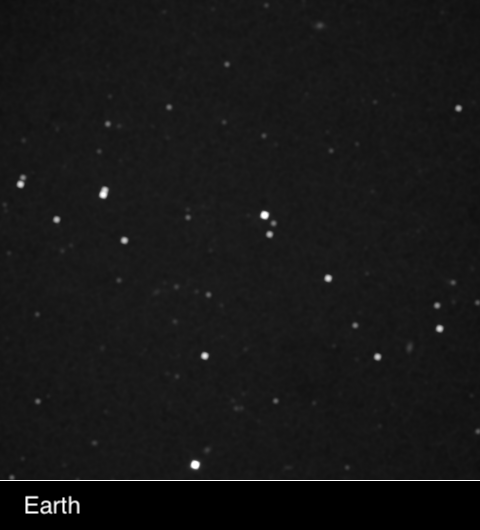 Star field with one star appearing to "blink" (change position), due to parallax.